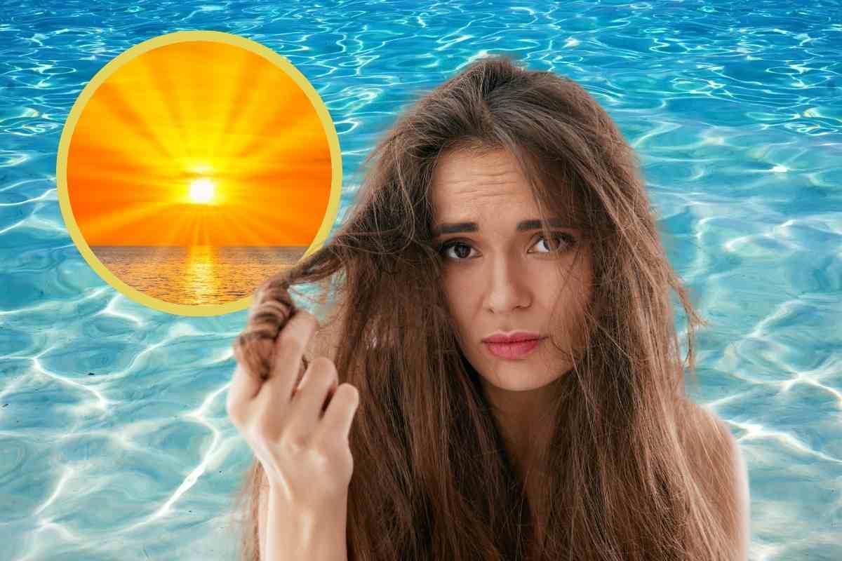 Ragazza con capelli rovinati al mare