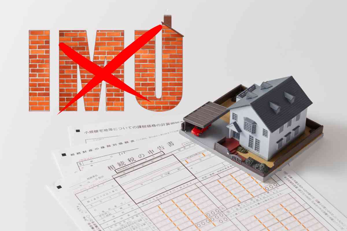modellino di casa e scritta barrata IMU
