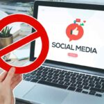 social network pc e cartello di divieto