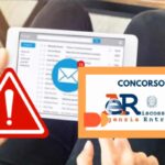 Mail con segnale di pericolo e logo Agenzia delle Entrate