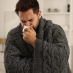 uomo con influenza