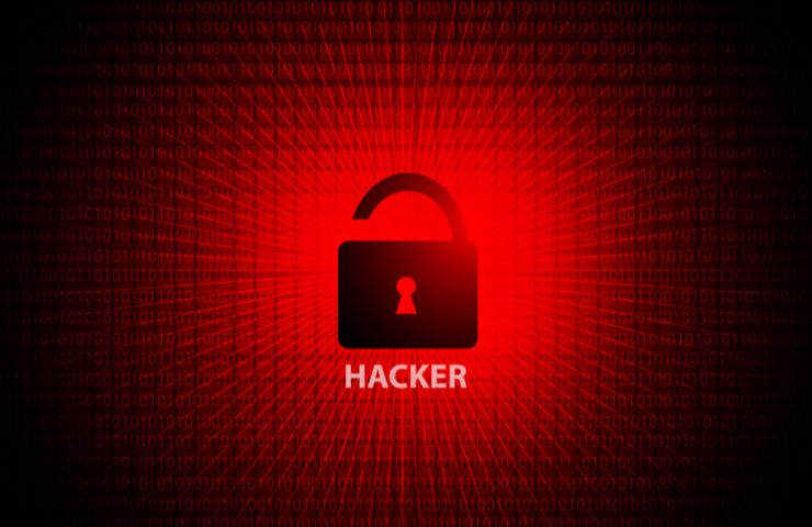 scritta hacker con icona di un lucchetto aperto su sfondo rosso